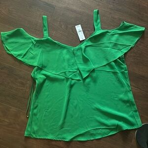 Very comfortable green ladies polyester top.
